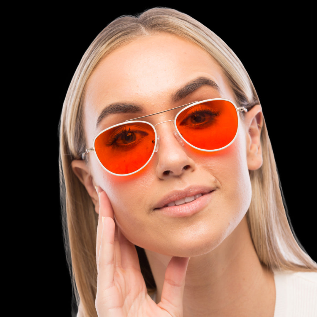 Woman wearing glasses that filter blue light